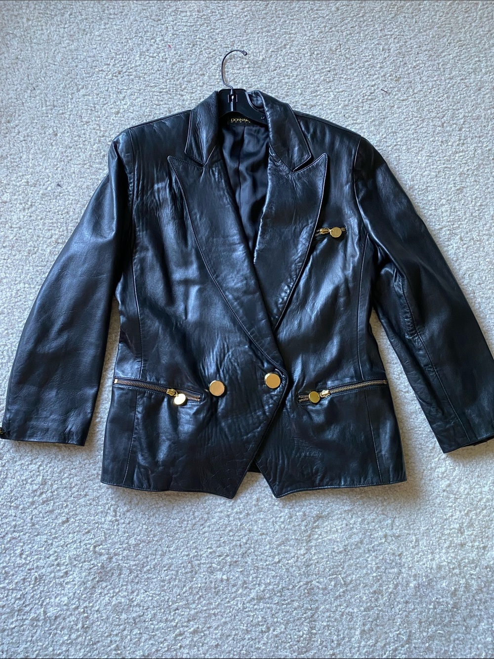 Donna Karan vintage black leather jacket with gold buttons and zippers, size 8